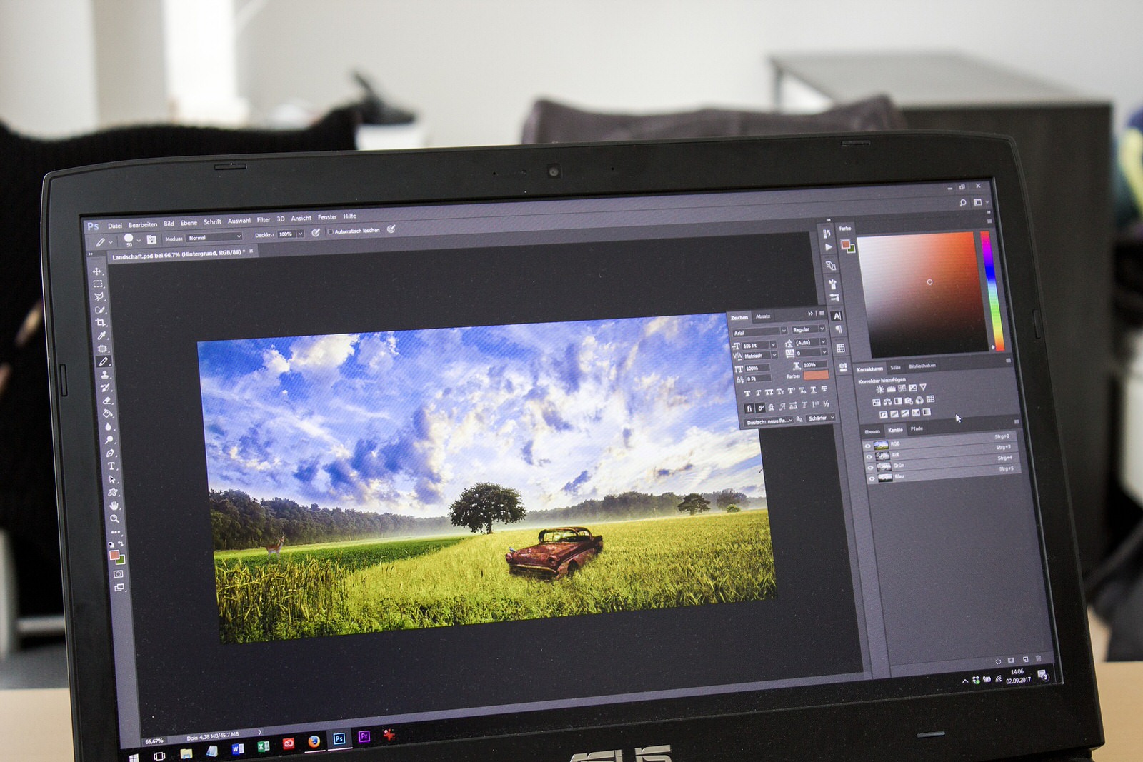 Photoshop interface on laptop screen
